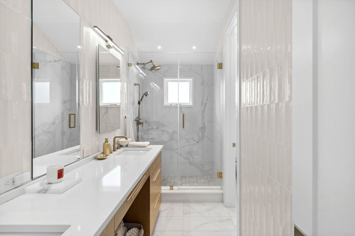Bathroom, Dual Sink Vanities, Glass Shower, Interior, Marble, Marble Walls, Recessed Lighting