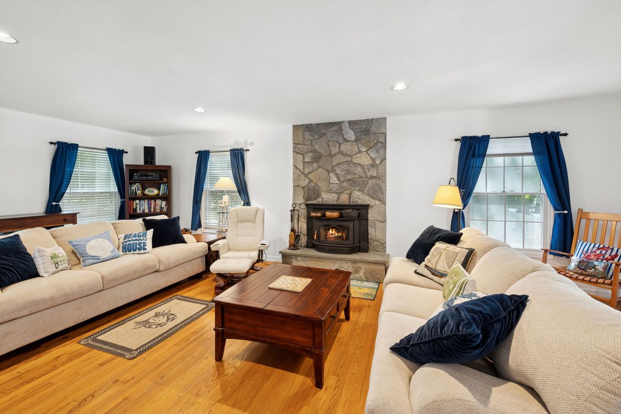 Fireplace, Interior, Living room, Recessed Lighting, Stone Walls, Wood Texture Flooring