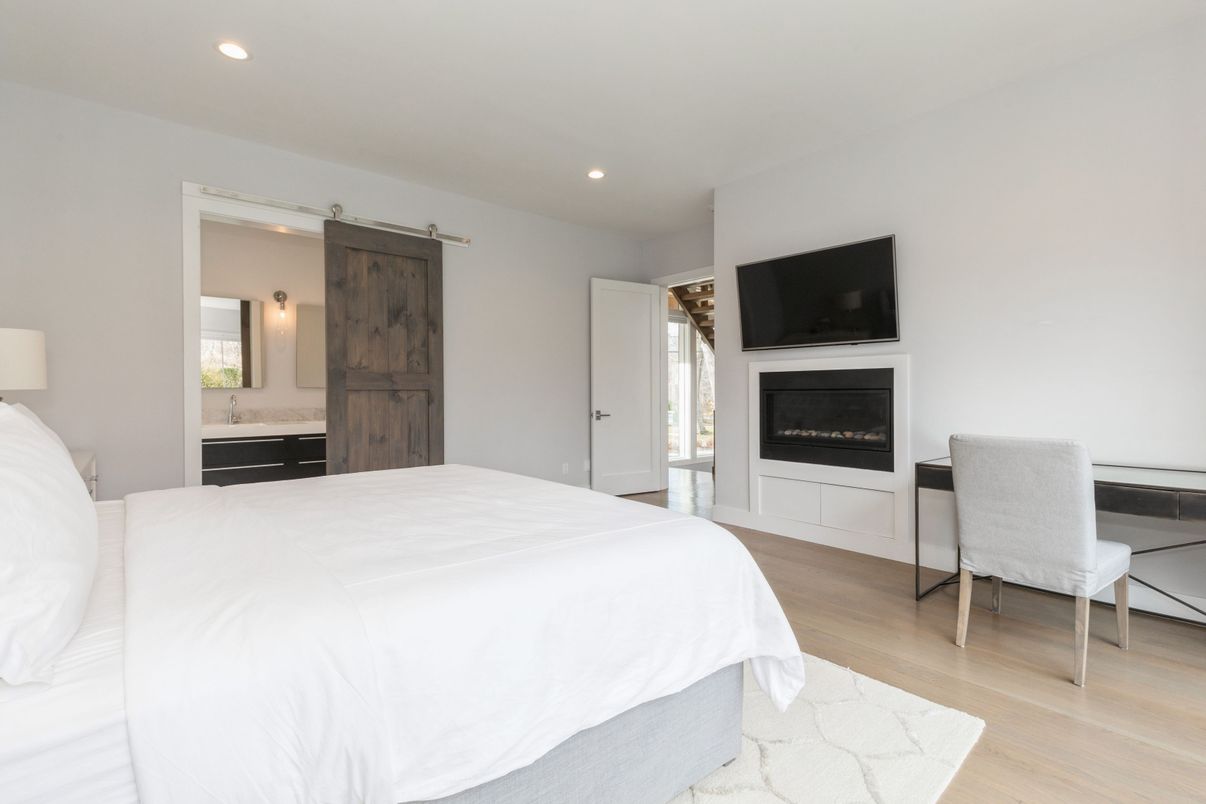 Bedroom, Fireplace, Interior, Recessed Lighting, Wood Texture Flooring