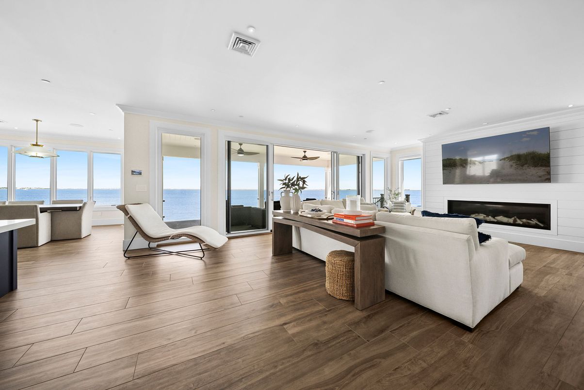 Fireplace, Interior, Living room, Pendant Lights, Recessed Lighting, Water, Wood Texture Flooring