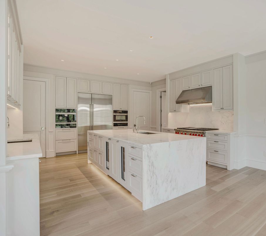 Interior, Kitchen, Marble Walls, Recessed Lighting, Stainless Steel Appliances, Wood Texture Flooring