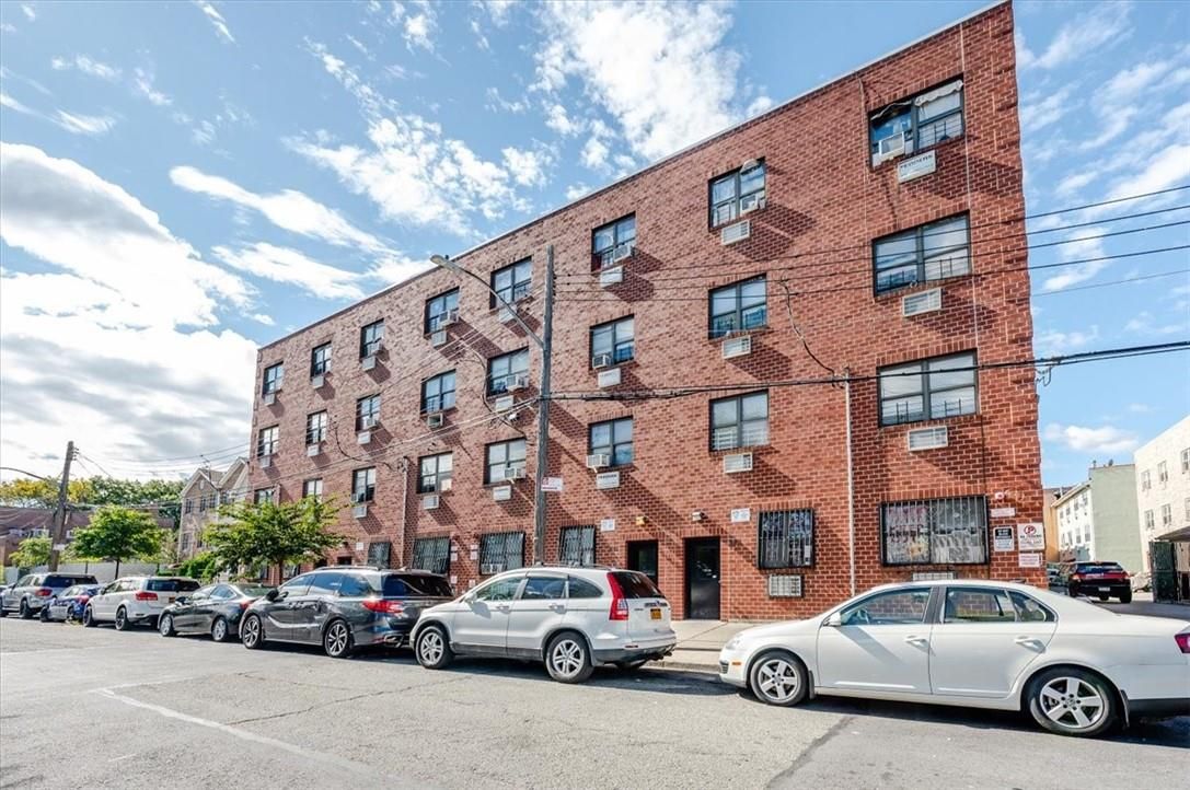 Exterior, Facade, Brick Facade, Condo Building