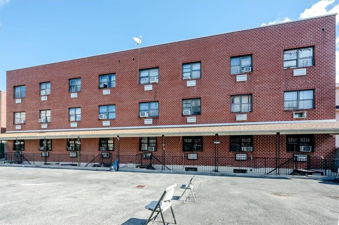 Exterior, Facade, Brick Facade, Condo Building