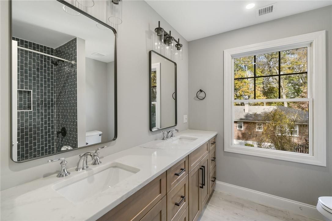 Bathroom, Dual Sink Vanities, Interior, Recessed Lighting, Wood Texture Flooring