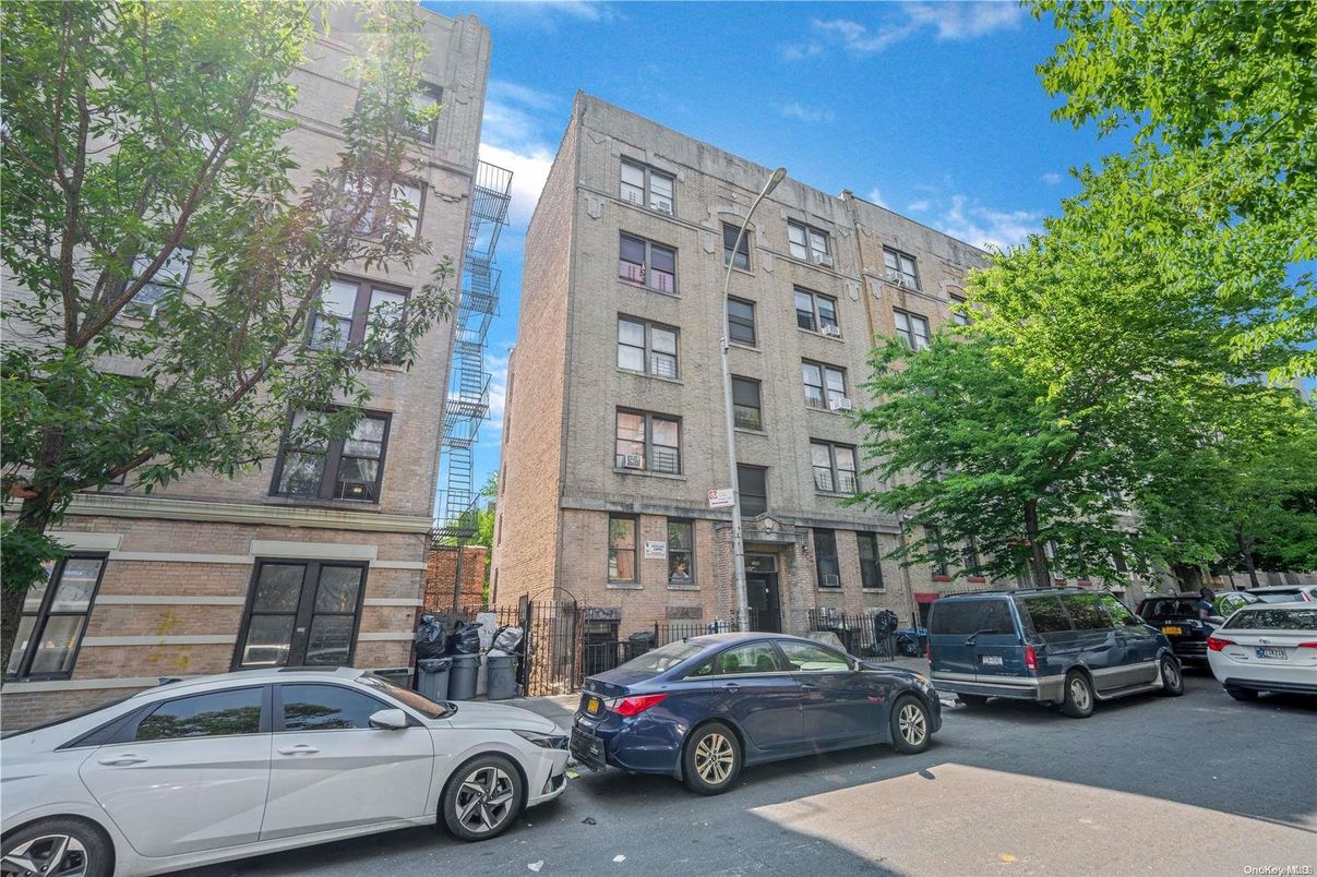 Exterior, Facade, Brick Facade, Condo Building