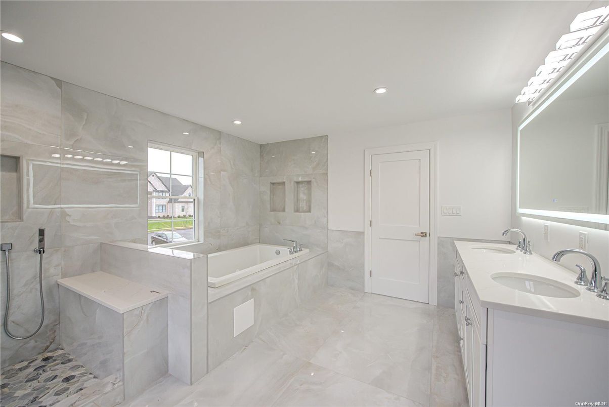 Bathroom, Dual Sink Vanities, Glass Shower, Interior, Marble Walls, Recessed Lighting
