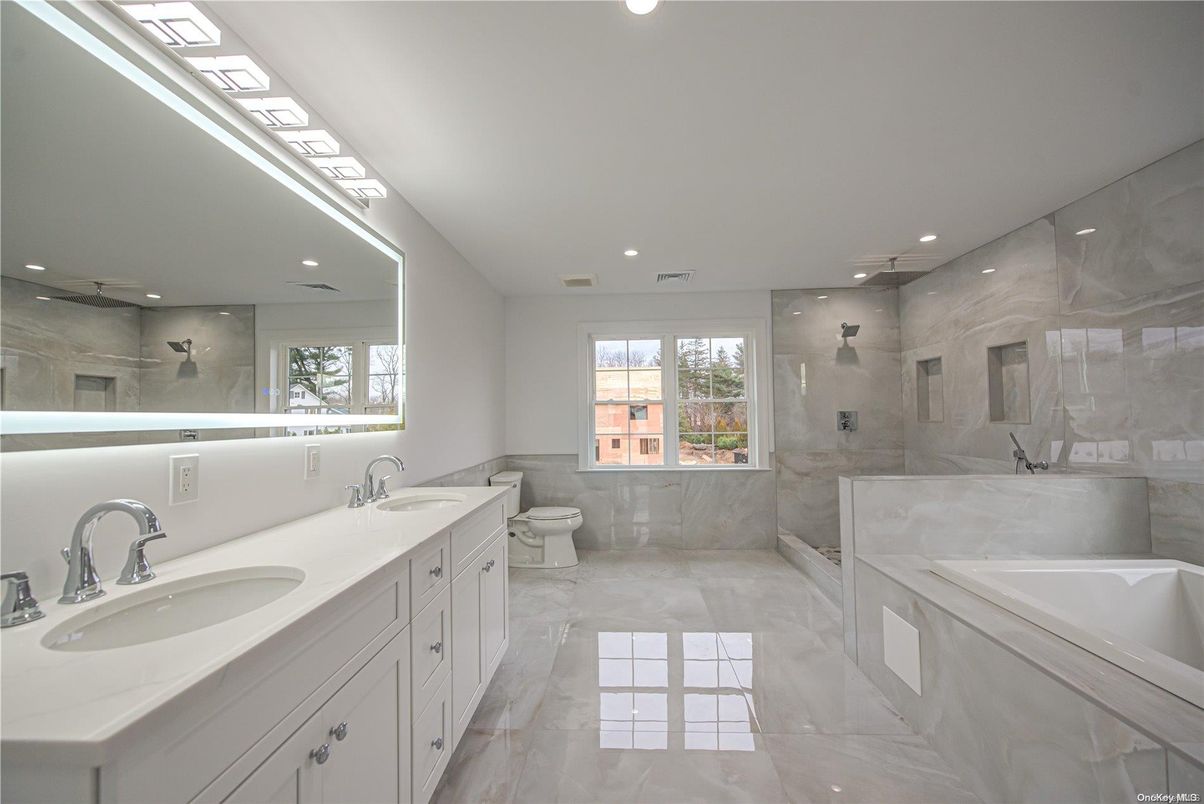 Bathroom, Dual Sink Vanities, Glass Shower, Interior, Marble, Recessed Lighting