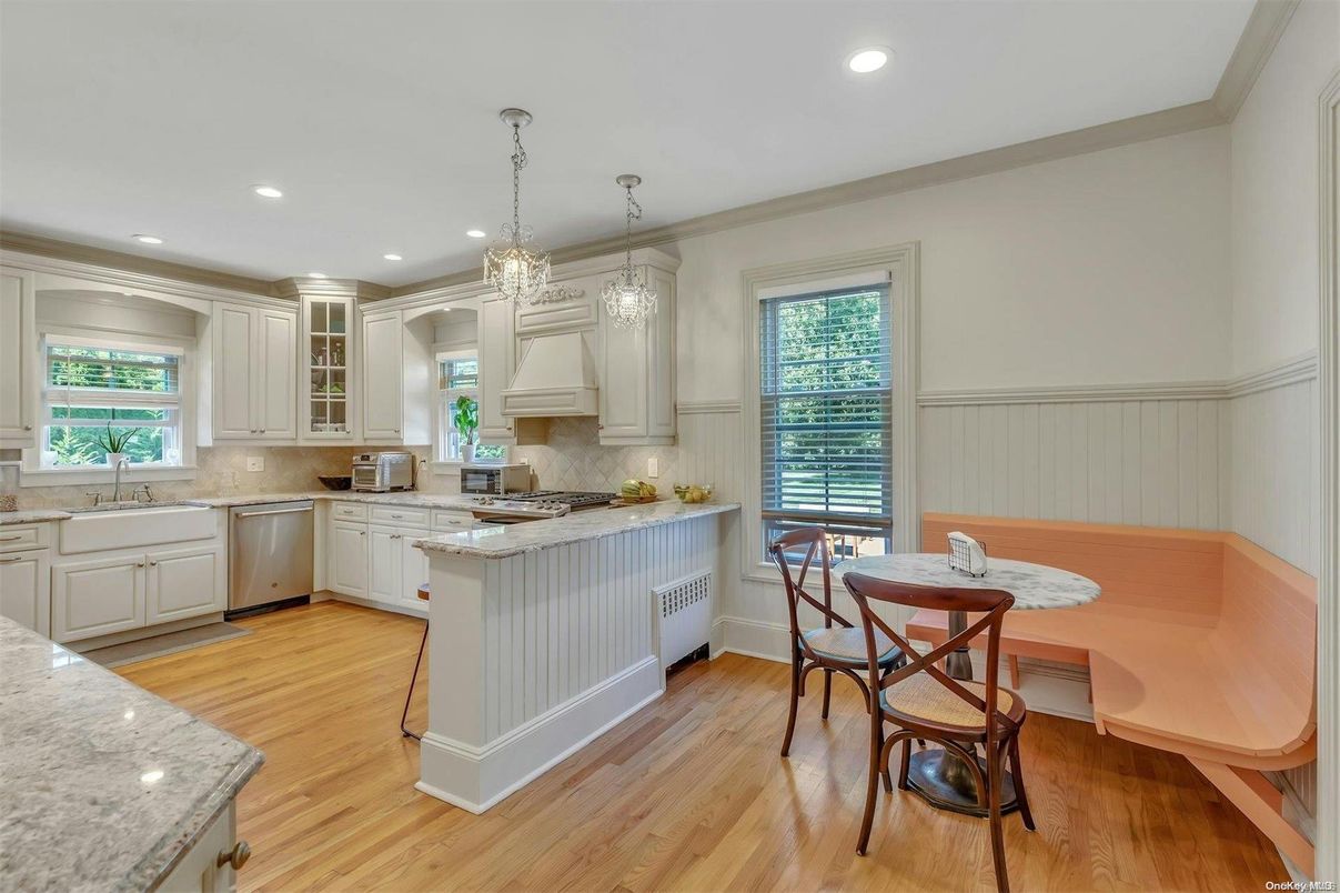 Chandelier, Dining room, Interior, Kitchen, Pendant Lights, Recessed Lighting, Stainless Steel Appliances, Wood Texture Flooring