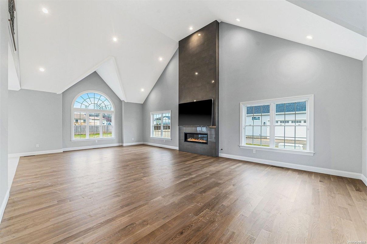 Empty room, Fireplace, Interior, Recessed Lighting, Wood Texture Flooring