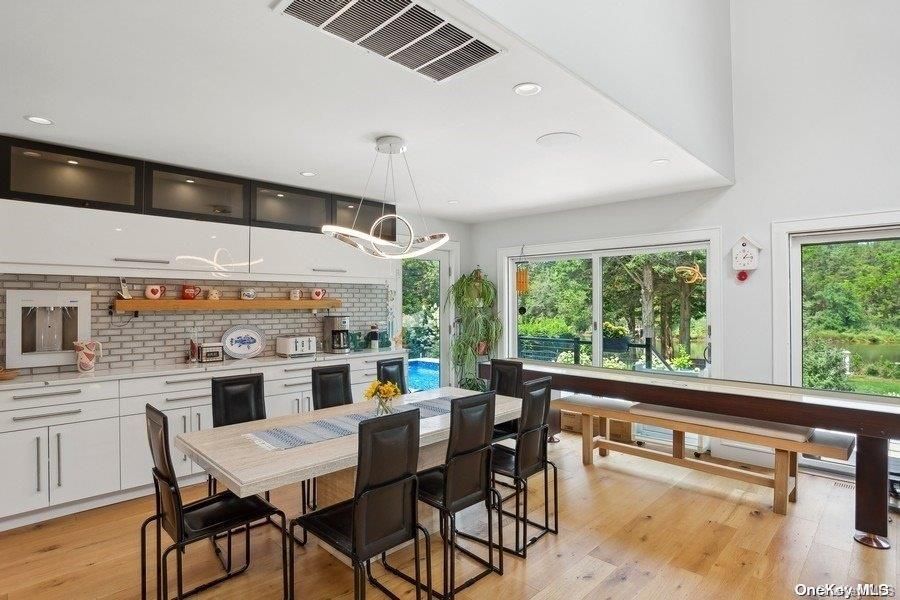 Dining room, Interior, Pendant Lights, Recessed Lighting, Stone Walls, Wood Texture Flooring