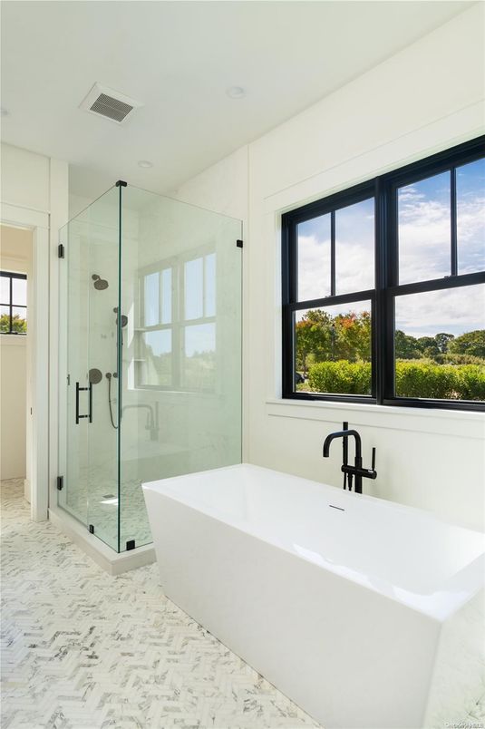Bathroom, Free Standing Baths, Glass Shower, Interior, Marble, Marble Walls, Recessed Lighting