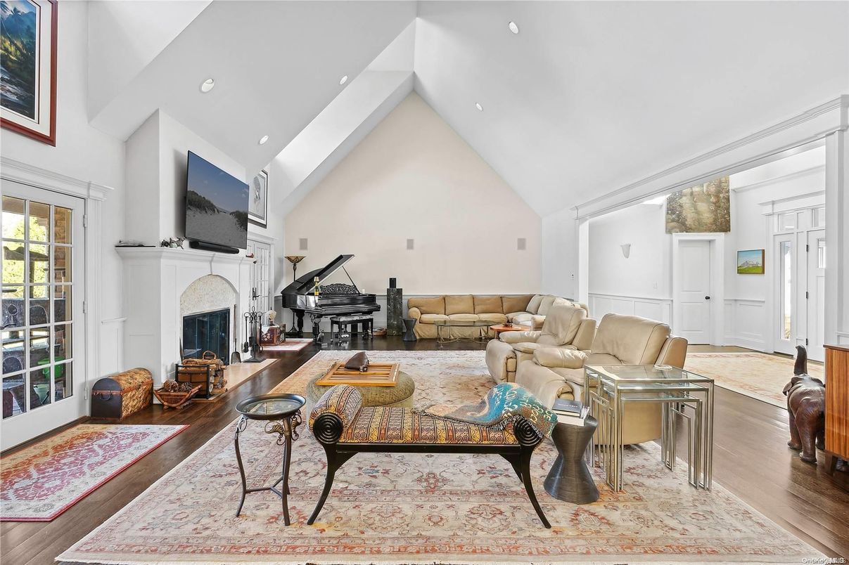 Fireplace, Interior, Living room, Piano, Recessed Lighting, Wood Texture Flooring