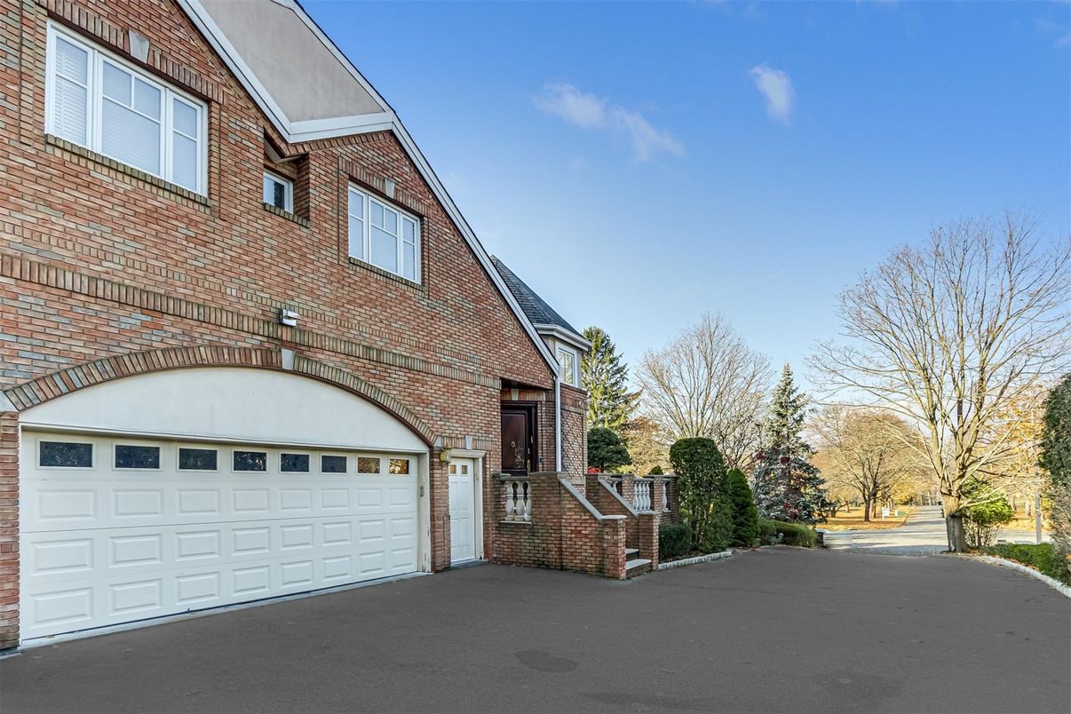 Attached, Exterior, Facade, Brick Facade, Tudor Revival