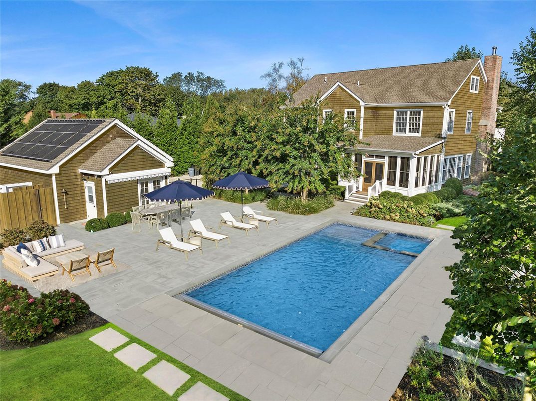 Exterior, Pool, Solar Panels