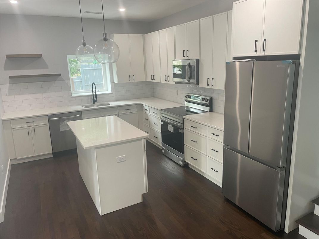 Interior, Kitchen, Pendant Lights, Recessed Lighting, Stainless Steel Appliances, Wood Texture Flooring