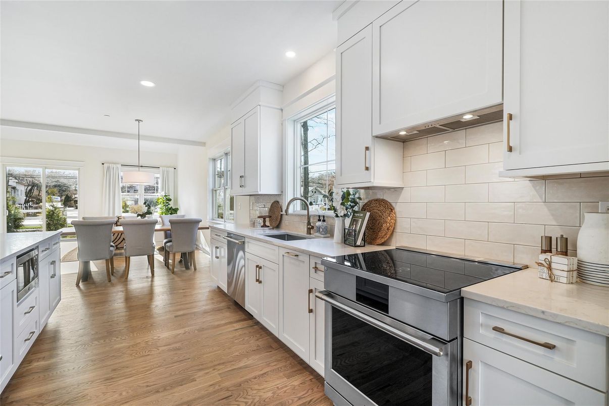 Dining room, Interior, Kitchen, Pendant Lights, Recessed Lighting, Stainless Steel Appliances, Wood Texture Flooring