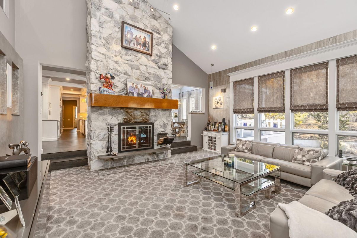 Fireplace, Interior, Living room, Pendant Lights, Recessed Lighting, Stone Walls, Wood Texture Flooring