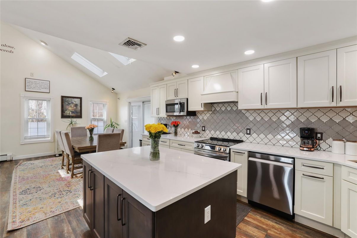 Dining room, Interior, Kitchen, Recessed Lighting, Stainless Steel Appliances, Wood Texture Flooring