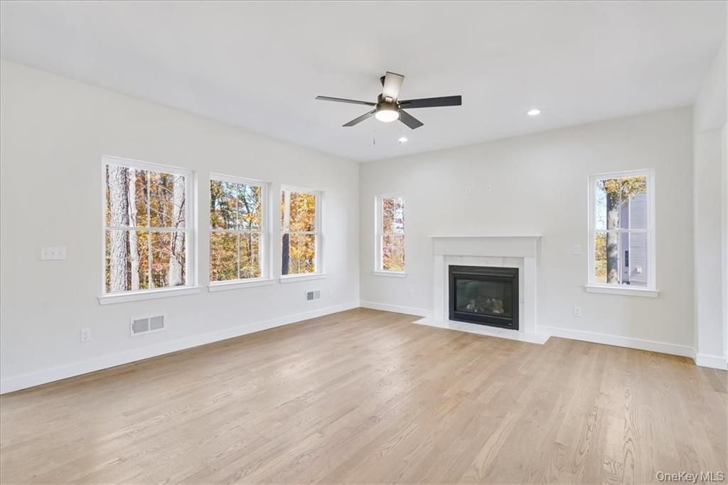 Empty room, Fireplace, Interior, Recessed Lighting, Wood Texture Flooring