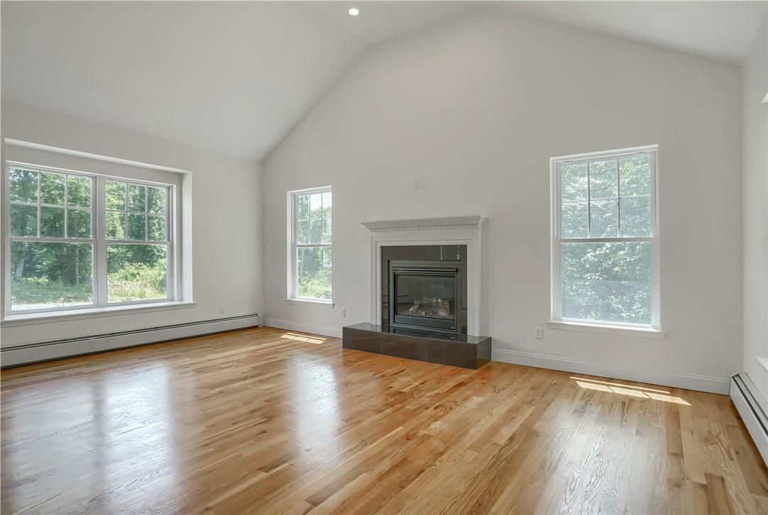 Empty room, Fireplace, Interior, Recessed Lighting, Wood Texture Flooring