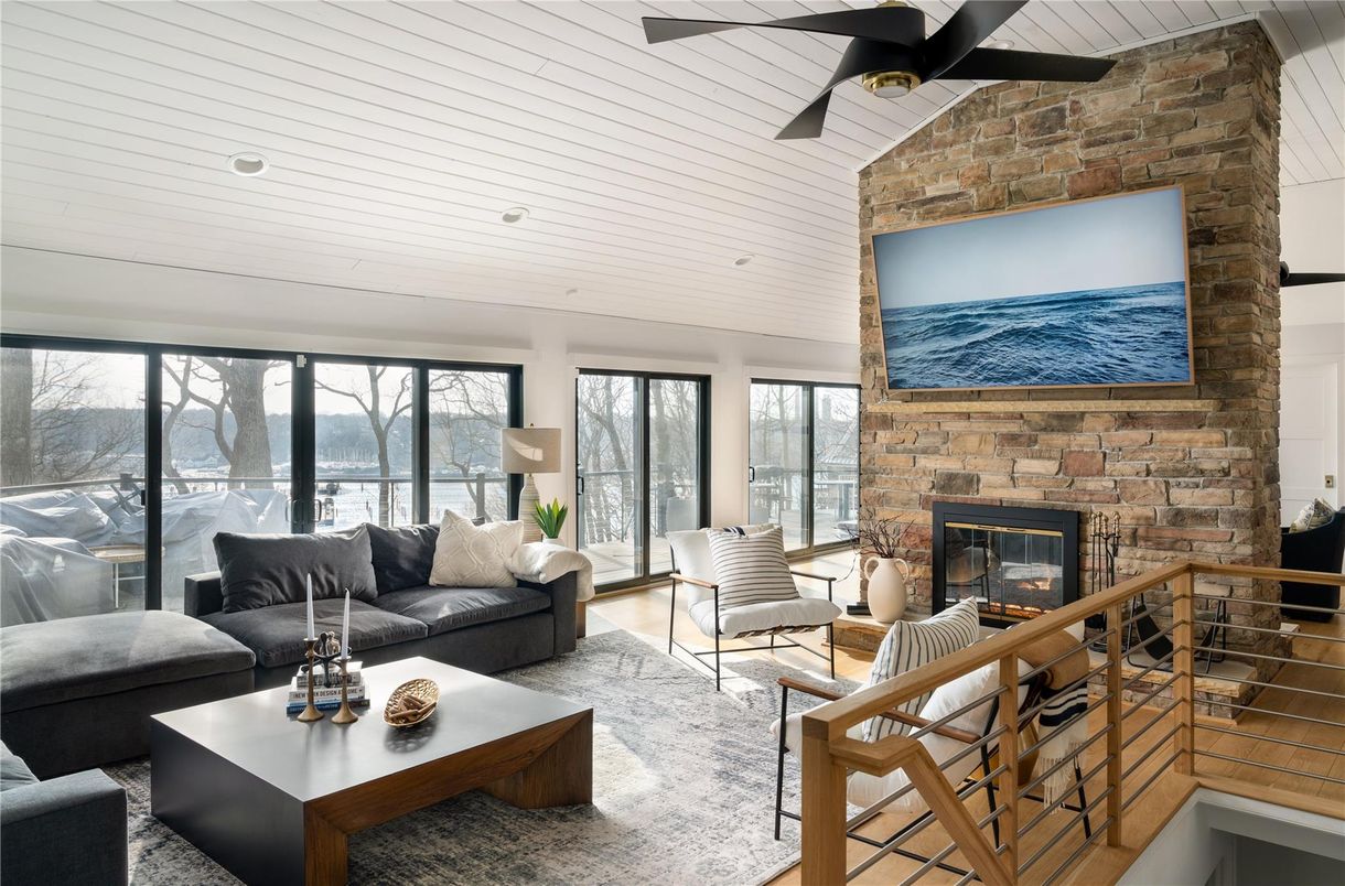 Fireplace, Interior, Living room, Recessed Lighting, Stone Walls, Wood Texture Flooring