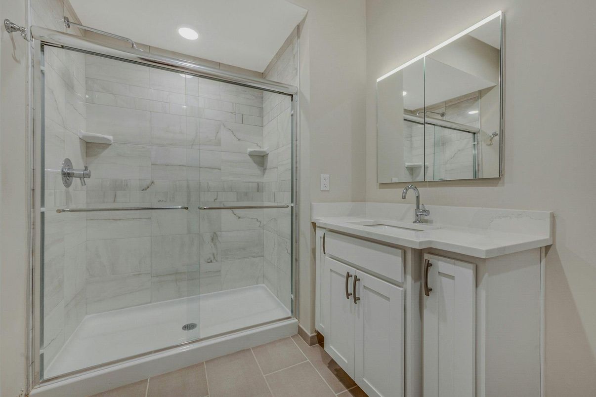 Bathroom, Dual Sink Vanities, Glass Shower, Interior, Marble Walls, Recessed Lighting