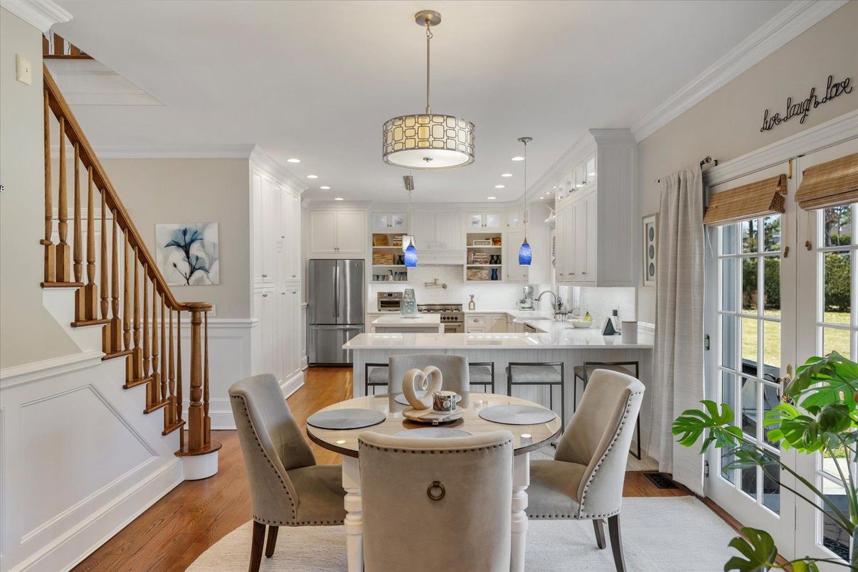 Dining room, Interior, Kitchen, Pendant Lights, Recessed Lighting, Stainless Steel Appliances, Wood Texture Flooring