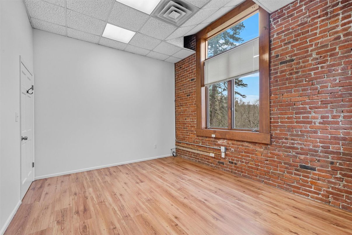 Empty room, Interior, Recessed Lighting, Stone Walls, Wood Texture Flooring