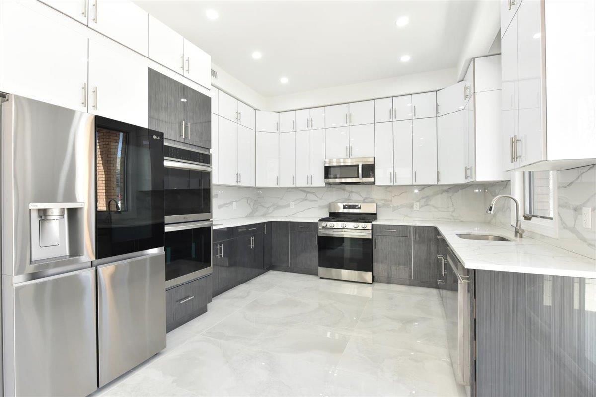 Interior, Kitchen, Marble, Marble Walls, Recessed Lighting, Stainless Steel Appliances