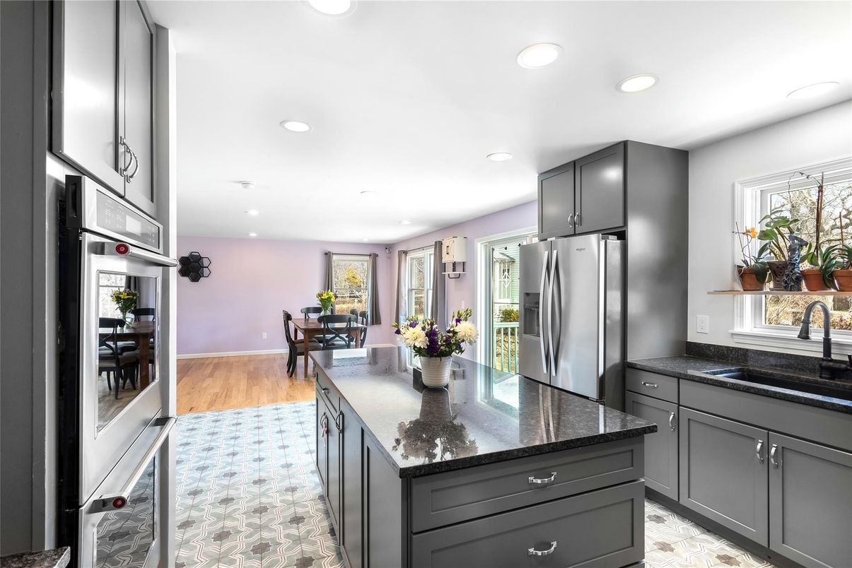 Dining room, Interior, Kitchen, Recessed Lighting, Stainless Steel Appliances, Wood Texture Flooring