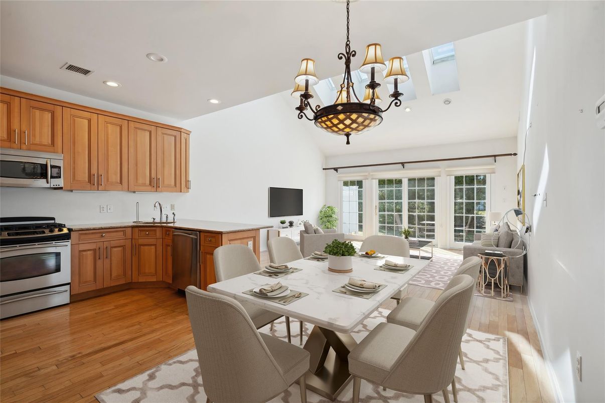 Chandelier, Dining room, Interior, Kitchen, Recessed Lighting, Stainless Steel Appliances, Wood Texture Flooring