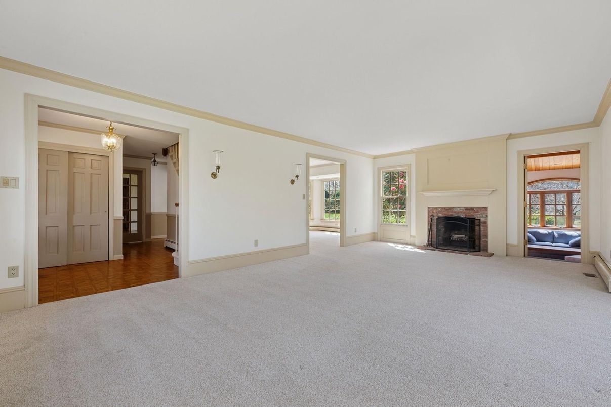 Chandelier, Empty room, Fireplace, Interior
