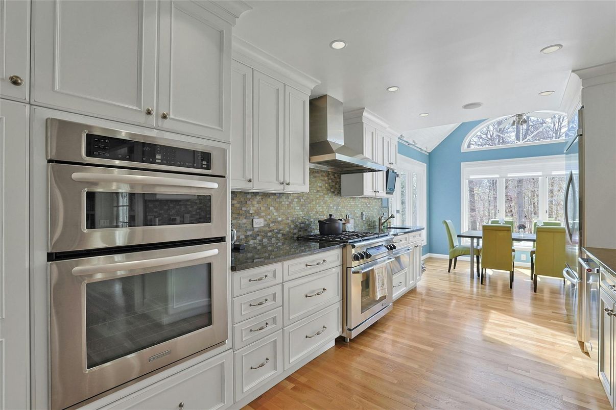 Dining room, Interior, Kitchen, Recessed Lighting, Stainless Steel Appliances, Wood Texture Flooring