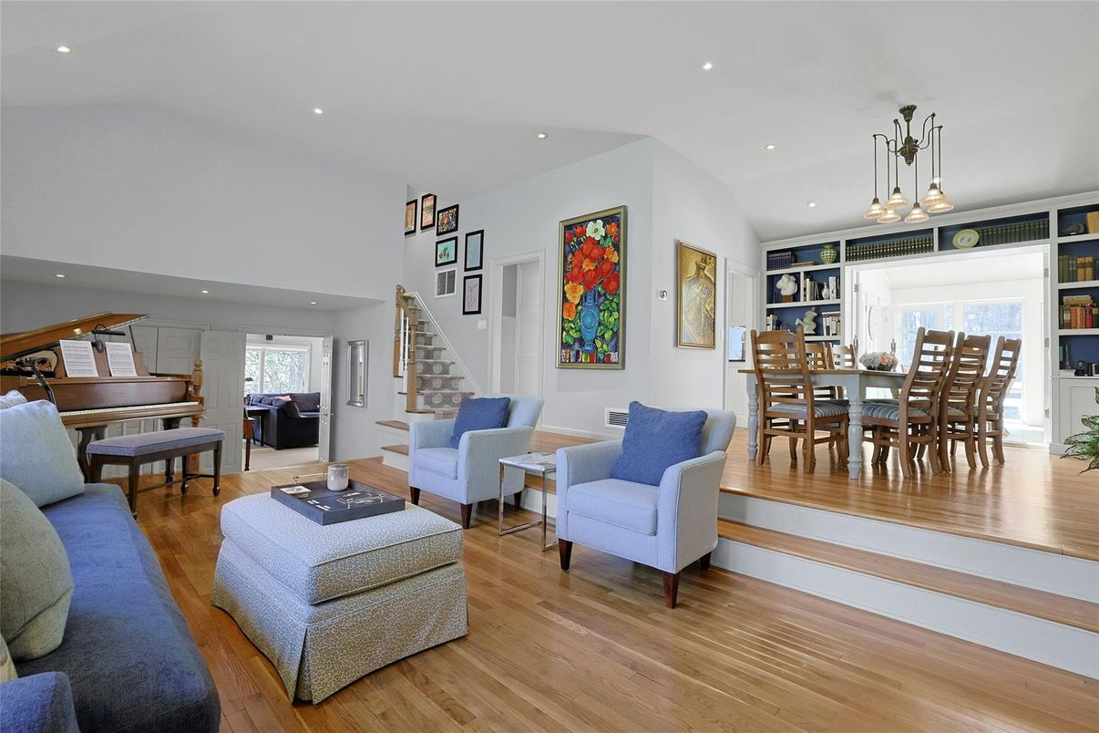 Dining room, Interior, Living room, Pendant Lights, Piano, Recessed Lighting, Wood Texture Flooring