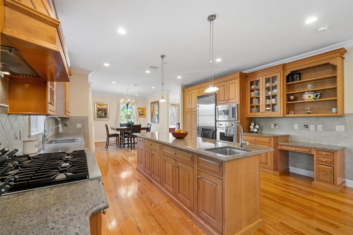 Chandelier, Dining room, Interior, Kitchen, Pendant Lights, Recessed Lighting, Stainless Steel Appliances, Wood Texture Flooring