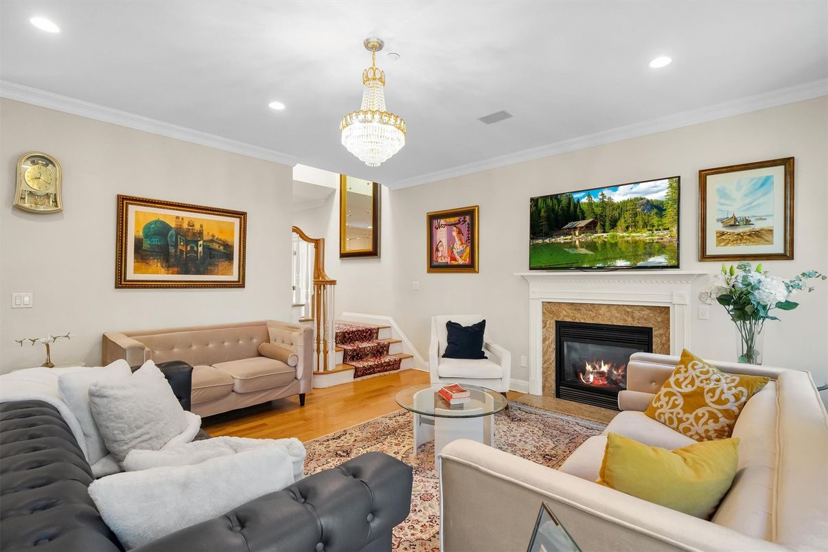 Chandelier, Fireplace, Interior, Living room, Recessed Lighting, Wood Texture Flooring