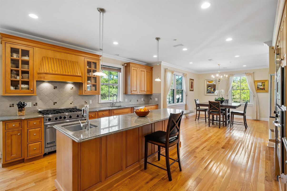 Chandelier, Dining room, Interior, Kitchen, Pendant Lights, Recessed Lighting, Stainless Steel Appliances, Wood Texture Flooring
