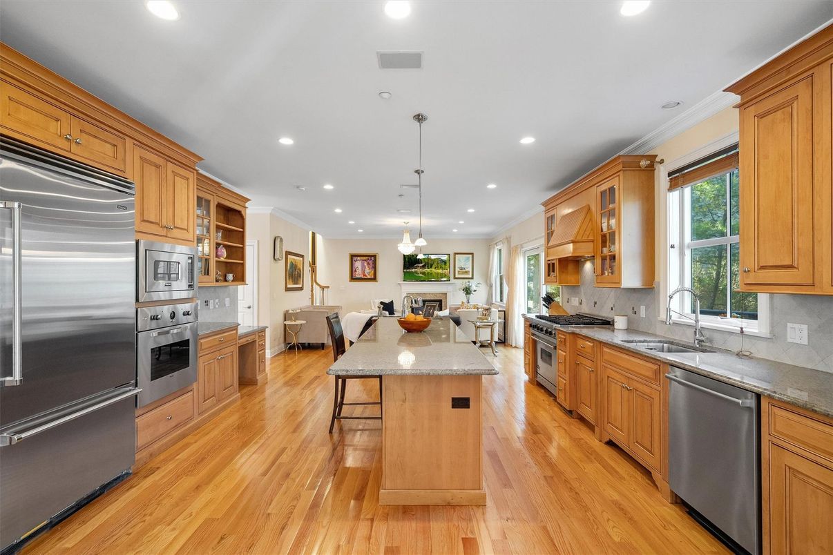 Dining room, Interior, Kitchen, Pendant Lights, Recessed Lighting, Stainless Steel Appliances, Wood Texture Flooring