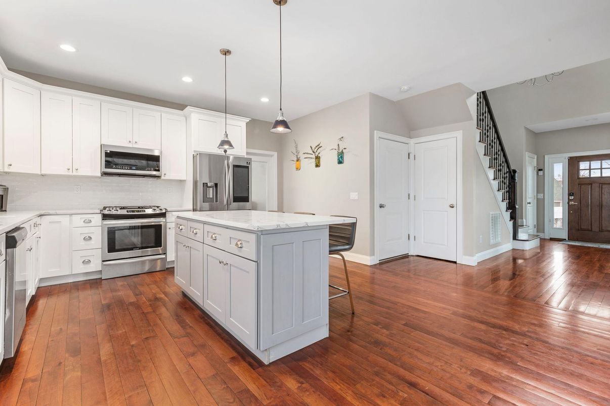 Interior, Kitchen, Pendant Lights, Recessed Lighting, Stainless Steel Appliances, Wood Texture Flooring