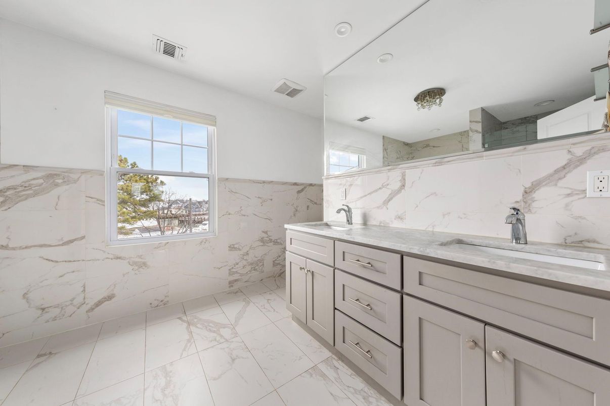 Bathroom, Dual Sink Vanities, Interior, Marble, Marble Walls, Recessed Lighting