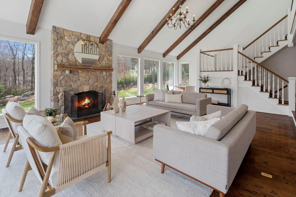 Chandelier, Fireplace, Interior, Living room, Stone Walls, Wooden Beams, Wood Texture Flooring