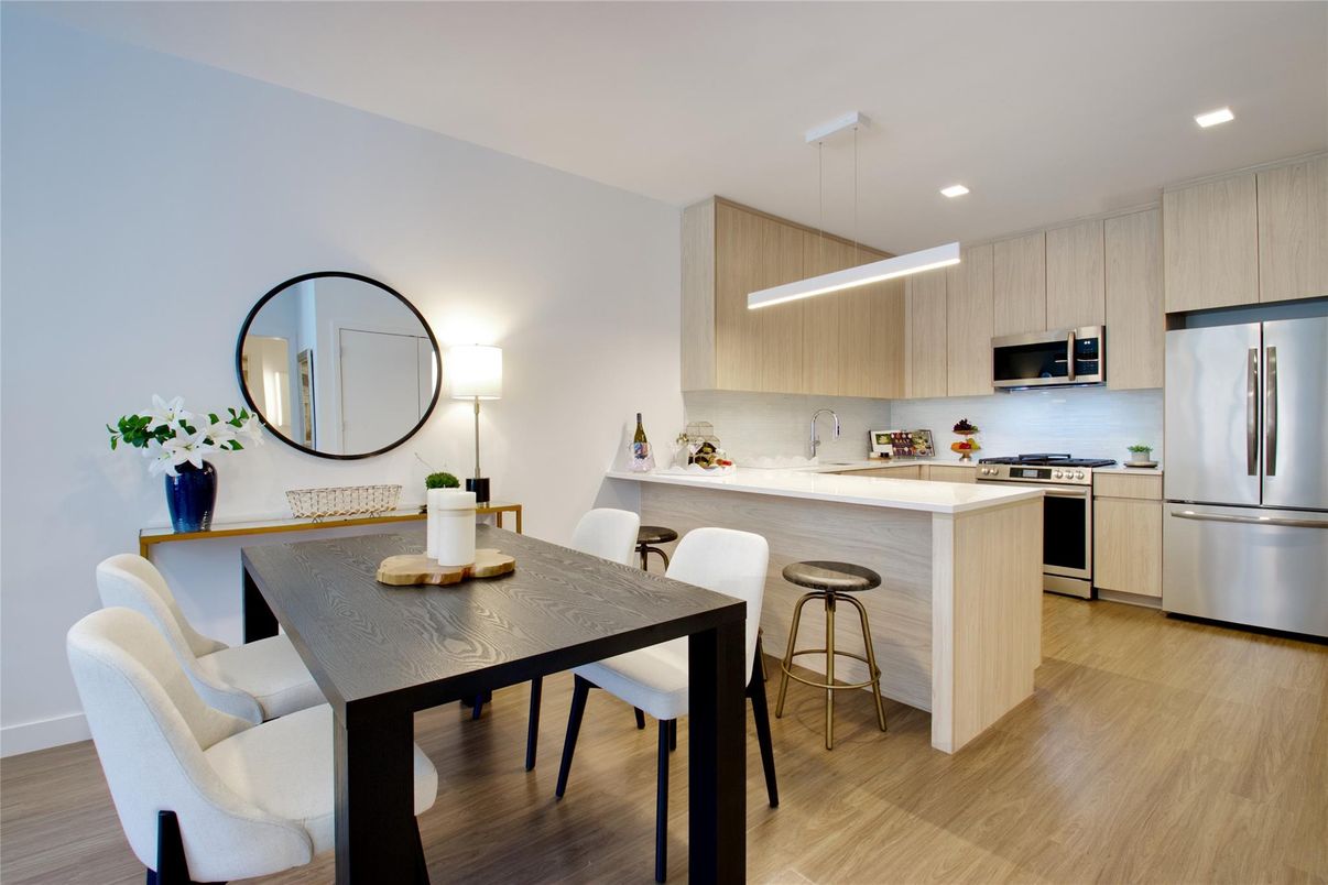 Dining room, Interior, Kitchen, Pendant Lights, Recessed Lighting, Stainless Steel Appliances, Wood Texture Flooring
