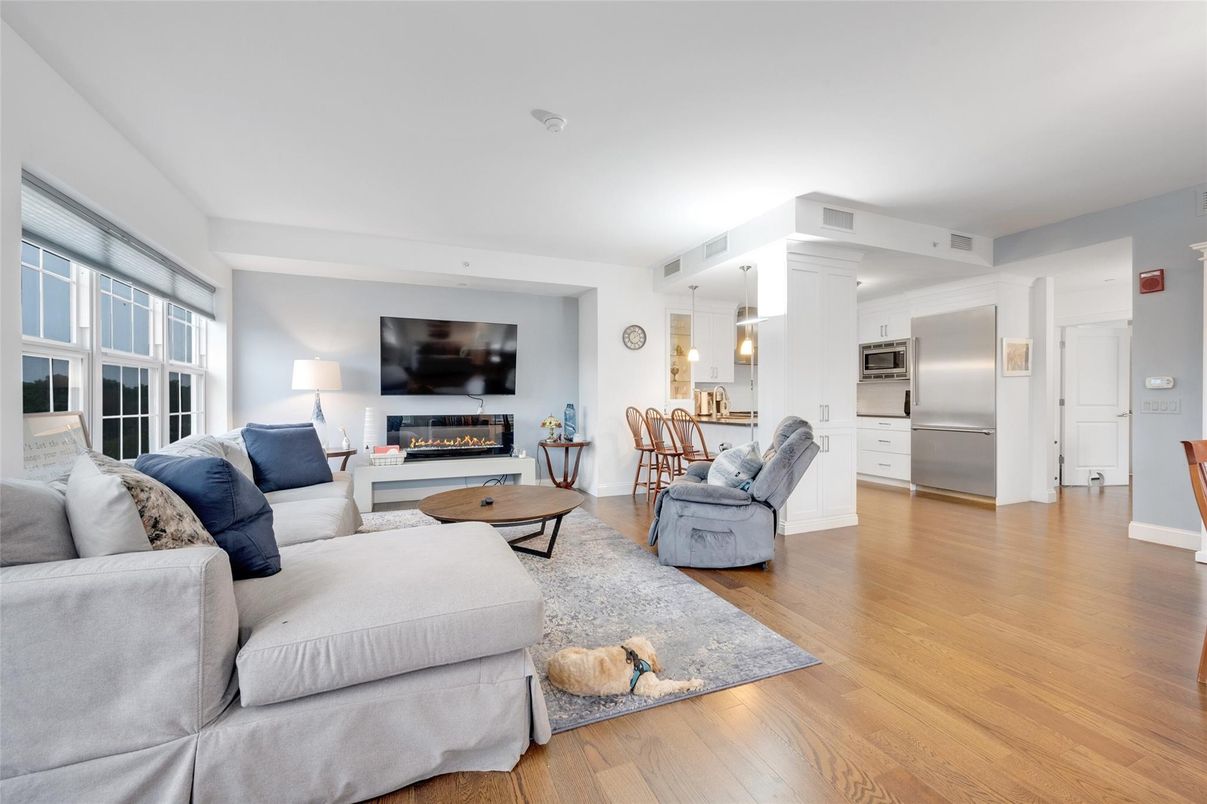 Fireplace, Interior, Kitchen, Living room, Pendant Lights, Stainless Steel Appliances, Wood Texture Flooring