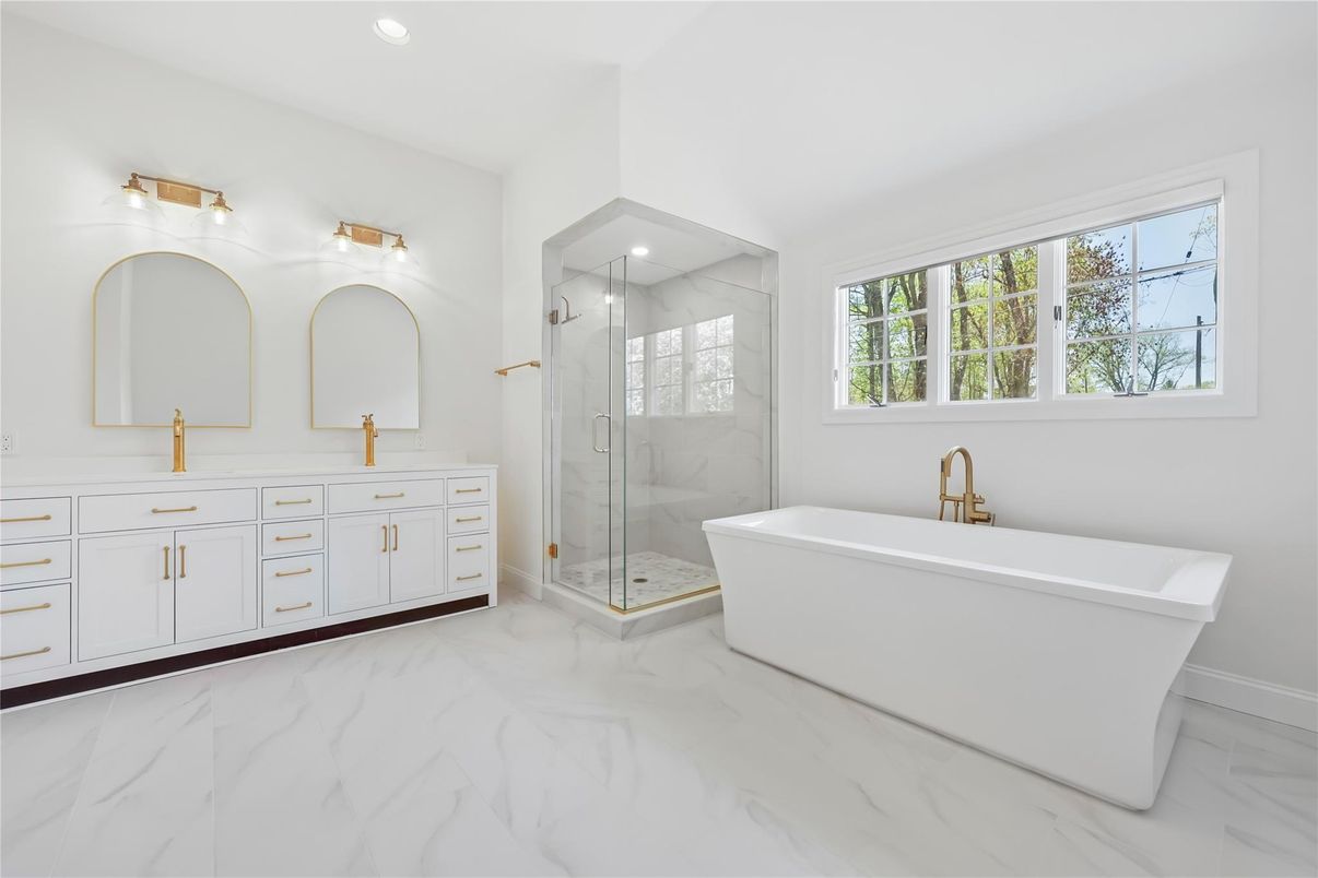 Bathroom, Free Standing Baths, Glass Shower, Interior, Marble, Marble Walls, Recessed Lighting