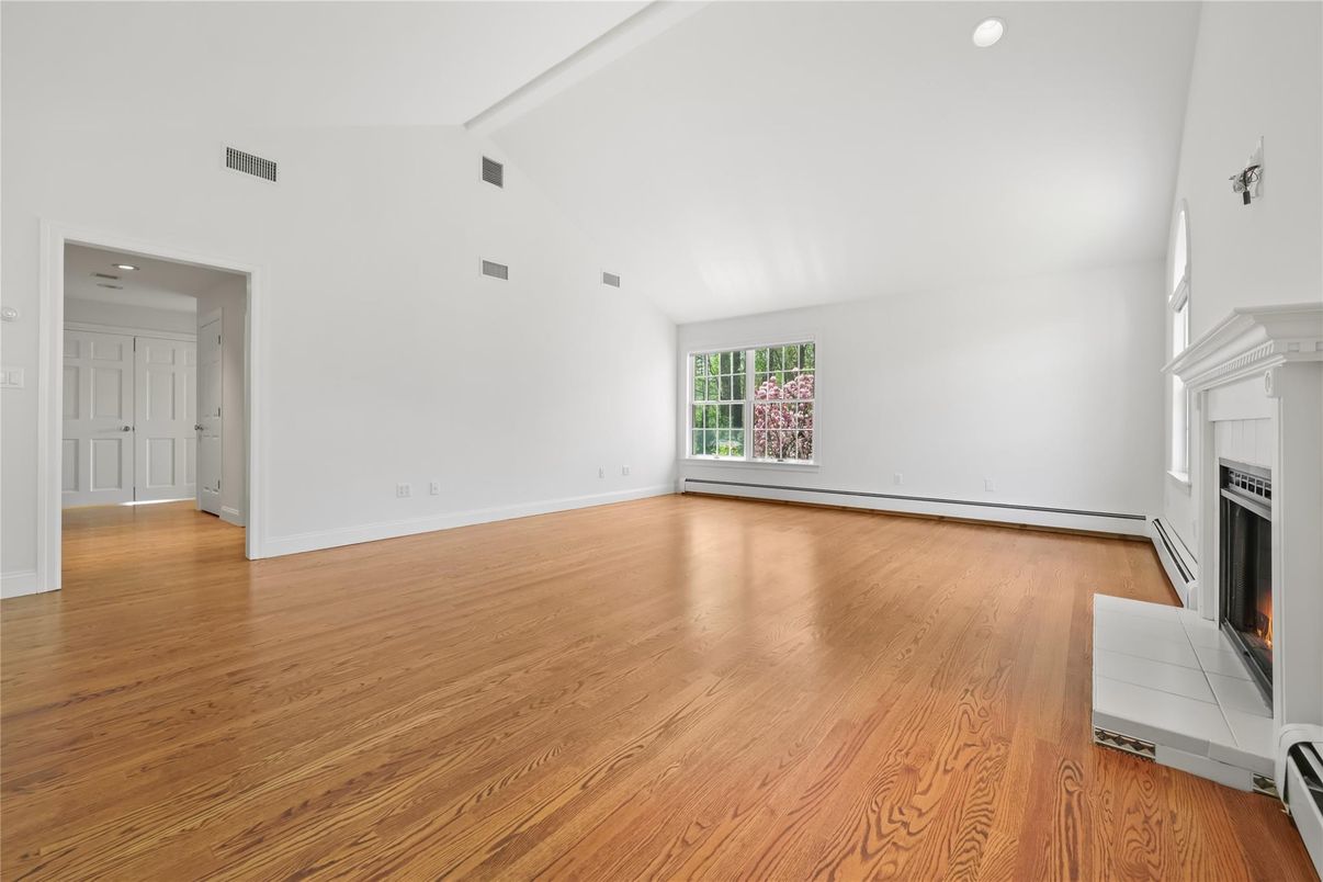 Empty room, Fireplace, Interior, Recessed Lighting, Wood Texture Flooring