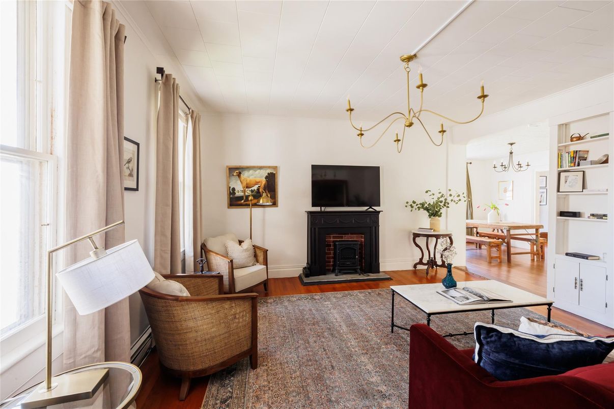 Chandelier, Dining room, Fireplace, Interior, Living room, Wood Texture Flooring