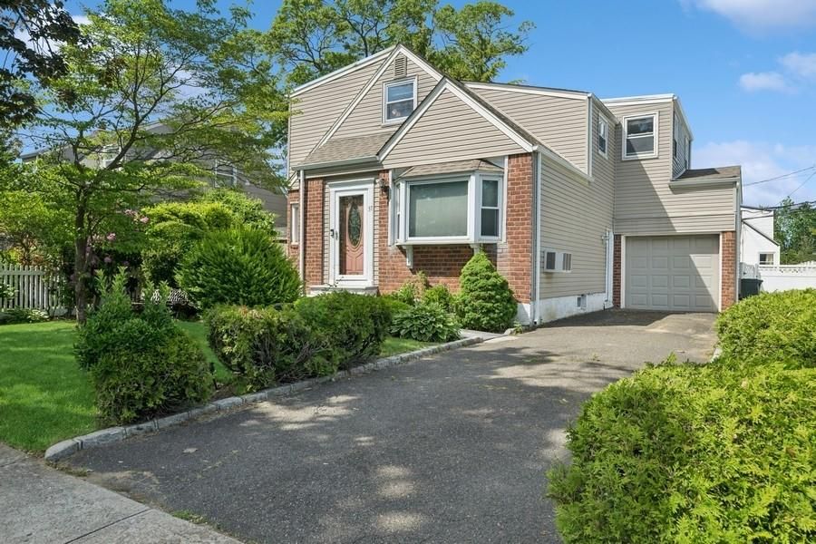 Attached, Exterior, Facade, Brick Facade, Cape Cod