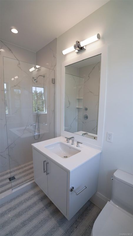 Bathroom, Glass Shower, Interior, Marble Walls, Recessed Lighting, Wood Texture Flooring