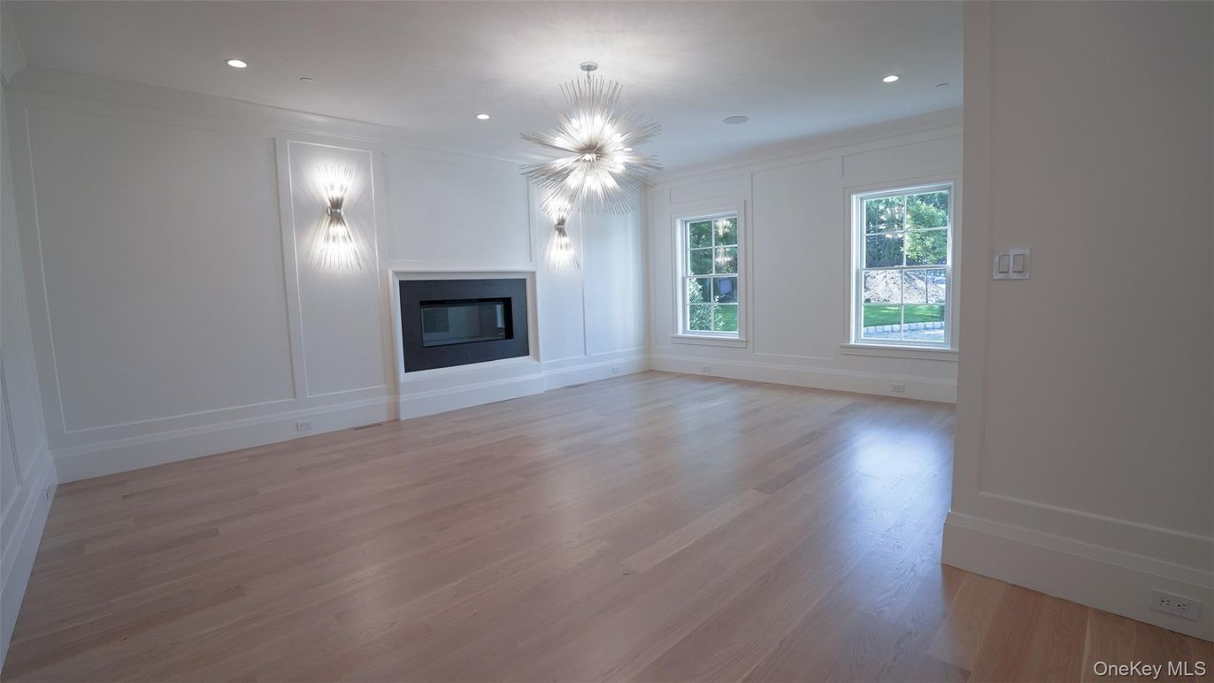 Empty room, Fireplace, Interior, Pendant Lights, Recessed Lighting, Wood Texture Flooring