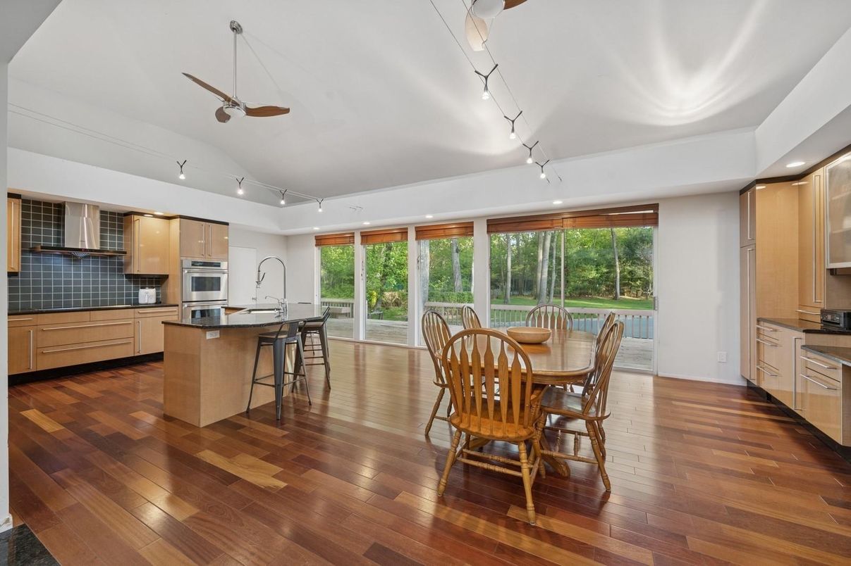 Dining room, Interior, Kitchen, Recessed Lighting, Stainless Steel Appliances, Wood Texture Flooring